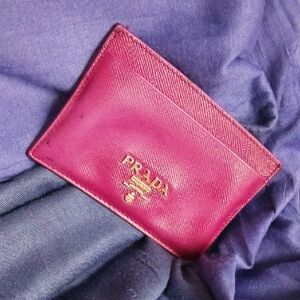 Prada Wine Leather Card Case with Gold Logo.